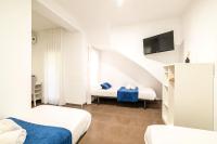 Posteľ alebo postele v izbe v ubytovaní Laramond Barcelona Rooms