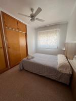 Posteľ alebo postele v izbe v ubytovaní Apartamento CA VALEN 2