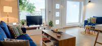 Televízia a/alebo spoločenská miestnosť v ubytovaní Lemon Tree Apartment