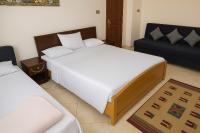 Postel nebo postele na pokoji v ubytování Peace House Dahab