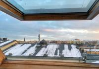 a view from the roof of a building with snow at Hotel Florenc in Prague