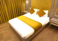 Postel nebo postele na pokoji v ubytování Taksim La Marino Hotel
