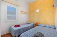 Postel nebo postele na pokoji v ubytování Villa Rose