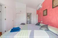 Postel nebo postele na pokoji v ubytování Villa Rose