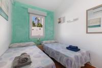 Postel nebo postele na pokoji v ubytování Villa Rose
