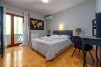 Łóżko lub łóżka w pokoju w obiekcie Villa Antea ZadarVillas