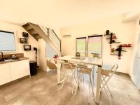 Kuchyňa alebo kuchynka v ubytovaní Résidence hôtelière les hameaux de saint cyprien appartement 2 chambres