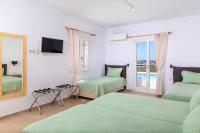 Posteľ alebo postele v izbe v ubytovaní Pyrgaki Hotel
