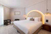 Ein Bett oder Betten in einem Zimmer der Unterkunft U Magic Palace