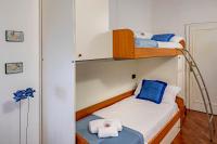Posteľ alebo postele v izbe v ubytovaní Dante's Rooms