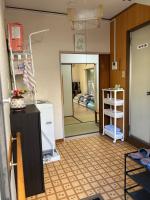 Küche&#47;Küchenzeile in der Unterkunft ハイツドリーム梦想小屋