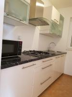 Kuchyňa alebo kuchynka v ubytovaní Apartments Villa Maslinica
