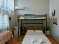 Posteľ alebo postele v izbe v ubytovaní Apartments Konstantinidis