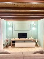 A television and/or entertainment centre at Design Loft - Nel cuore di Roma