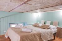 A bed or beds in a room at Design Loft - Nel cuore di Roma