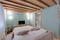 A bed or beds in a room at Design Loft - Nel cuore di Roma