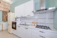 A kitchen or kitchenette at Design Loft - Nel cuore di Roma