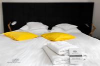 Posteľ alebo postele v izbe v ubytovaní Hotel Nafta Krosno
