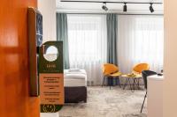 Posteľ alebo postele v izbe v ubytovaní Hotel Nafta Krosno