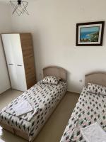Ein Bett oder Betten in einem Zimmer der Unterkunft Montebello Inn apartments