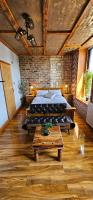 a bedroom with two beds and a table in it at The Shepherds Rest in Halifax
