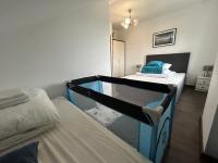 Posteľ alebo postele v izbe v ubytovaní Delfinek - Domki Apartamenty