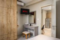 A bed or beds in a room at Liostasi