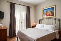 A bed or beds in a room at Liostasi