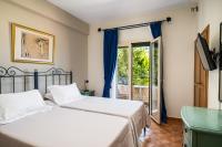 A bed or beds in a room at Liostasi