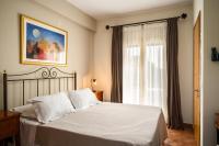 A bed or beds in a room at Liostasi