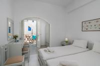 Posteľ alebo postele v izbe v ubytovaní Apollon Rooms