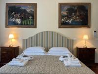 A bed or beds in a room at Casino di Pragatto