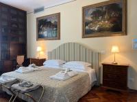 A bed or beds in a room at Casino di Pragatto