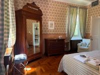 A bed or beds in a room at Casino di Pragatto