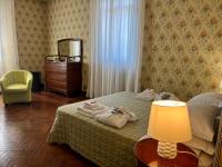 A bed or beds in a room at Casino di Pragatto