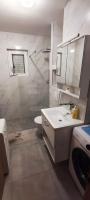 Kúpeľňa v ubytovaní Apartman SARA GALILEO BLIZU PLAZE
