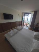 A bed or beds in a room at Guest House Skalite