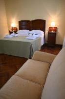 A bed or beds in a room at Casino di Pragatto