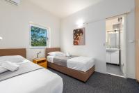 Postel nebo postele na pokoji v ubytování Villa Dandelion ZadarVillas