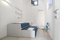 A bed or beds in a room at Nara Apartments 1 - Private Jacuzzi