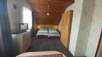 Posteľ alebo postele v izbe v ubytovaní Al Do Apartman