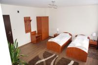 Łóżko lub łóżka w pokoju w obiekcie Hotel Vega