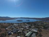 an aerial view of a town next to a lake at Acacia Snowy Motel in Jindabyne