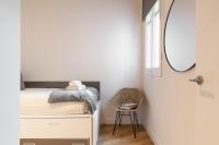 Postel nebo postele na pokoji v ubytování Enjoy Apartments La Riera One