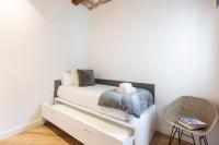 Postel nebo postele na pokoji v ubytování Enjoy Apartments La Riera One