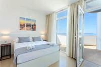 Posteľ alebo postele v izbe v ubytovaní Sunset Split Rooms