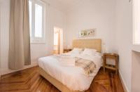 Postel nebo postele na pokoji v ubytování Apartamentos Alcalá