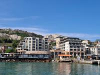 een groep gebouwen naast een waterlichaam bij Sea View Apartment C 514 in Balchik
