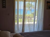 Postel nebo postele na pokoji v ubytování Glyfada Beachfront House Ab3g