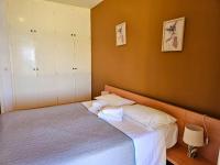 Postel nebo postele na pokoji v ubytování Glyfada Beachfront House Ab3g